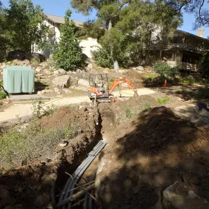 Power and data conduit being installed in the Arroyo Section
