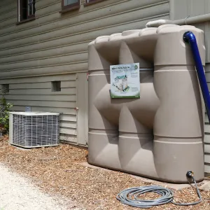 Home Demonstration Garden Renovation, rainwater collection system on west side of Cottage
