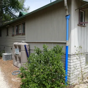 Home Demonstration Garden Renovation, rainwater collection system on west side of Cottage