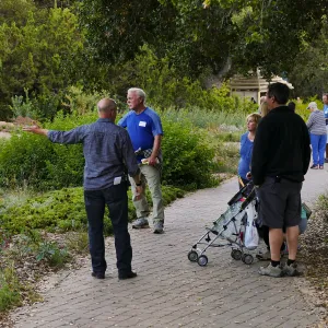 Member Appreciation Month, Full Moon Hike, Steve Windhager leading group near Meadow
