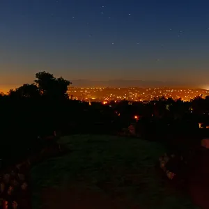 Island View Garden, city and channel under a full moon