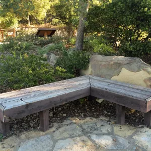 Wood benches at Home Demonstration Garden entrance