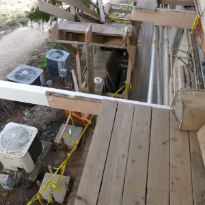 Library structural repair work, east side deck and stairs
