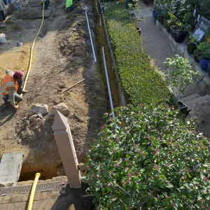 Courtyard renovation, rerouting piping, west edge looking south