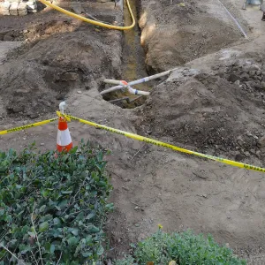 Courtyard renovation, rerouting piping, west edge looking north