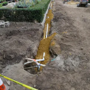 Courtyard renovation, rerouting piping, west edge looking north