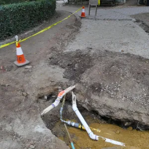 Courtyard renovation, rerouting piping, southwest corner looking west