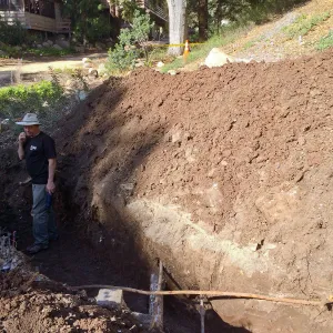 Power and data conduit being installed in the Arroyo Section