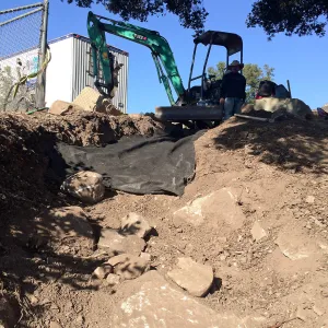 Construction of drainage culvert southeast corner of upper parking lot.