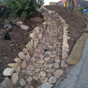 Completed drainage culvert southeast corner of upper parking lot.