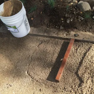Repair of Eco-Pave path at Water Wise Home Garden