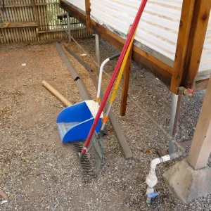 Garden Growers Lath House before start of repairs, water supply line interior shutoff valve (plastic in foreground)