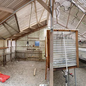 Garden Growers Lath House at start of repairs. Panorama of interior from center of space.