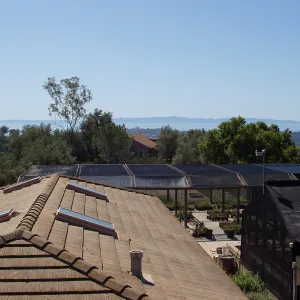 View looking south from upper parking area over Horticulture Unit roof
