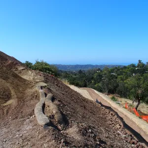 Pritzlaff Conservation Center construction, west slope access trail grading, looking southwest