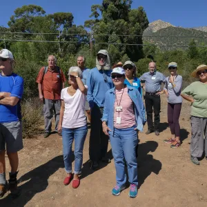 Tour of Pritchett Trail renovations, participants enjoying view from top of Island View Spur