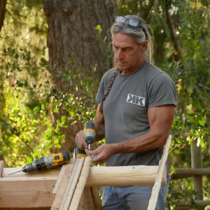 Teahouse & Garden Improvements 2017; Ken Kutcher working on roof details