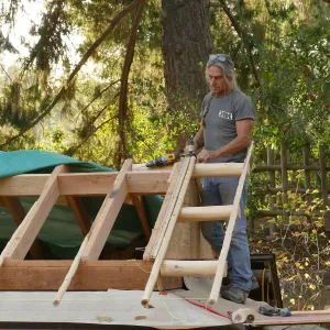 Teahouse & Garden Improvements 2017; Ken Kutcher working on roof details