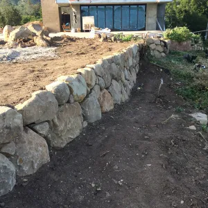 Reconstruction of east side wall at the Conservation Center