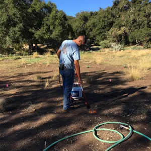 Wes Franken using a torch for weed abatement