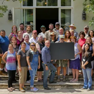 SBBG Staff photo with blank sign