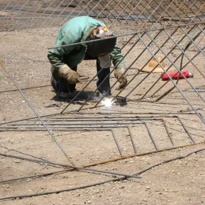 Construction of Herb Parker's â€˜Haven' labyrinth, welding roof framework