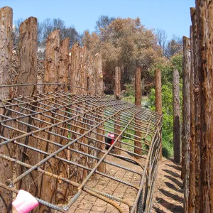 Construction of Herb Parker's â€˜Haven' labyrinth, placing roof structure