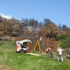 Construction of Herb Parker's â€˜Haven' labyrinth, placing roof structure