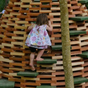 Santa Barbara Botanic Garden Casitas Opening, child playing on â€œThe Hivesâ€ Casita