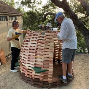 Volunteers building â€˜The Hives' casitas