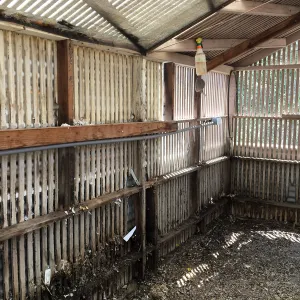 Repair of Garden Growers Lath House, southwest corner