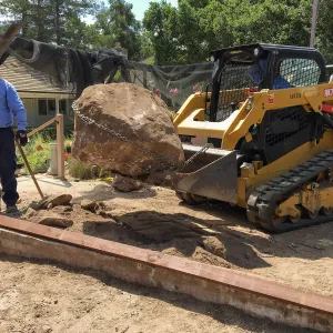 Repair of Garden Growers Lath House. Removing boulders