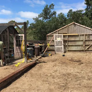 Repair of Garden Growers Lath House, looking west