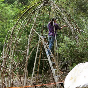 Betsy Lape working on the Woodrat House Casita