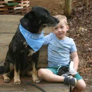 Boy and dog at the Hives Casita