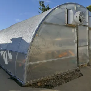 Southeast corner of the Hoop House at Horticulture Unit after installation of reflective shade covering