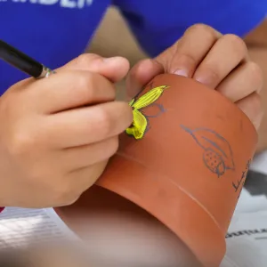 Acorn Adventurers Summer Camp, flower pot decorating activity