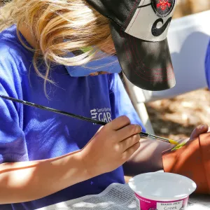 Acorn Adventurers Summer Camp, flower pot decorating activity