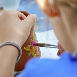 Acorn Adventurers Summer Camp, flower pot decorating activity