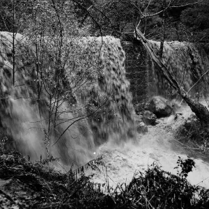 Flood waters over Mission Dam