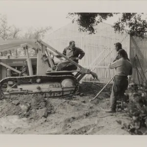 Breaking ground with tractor, Carl, Joe, Jim