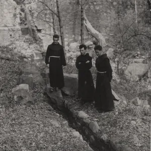 Friars (Padres) studying the ancient Aqueduct below Old Mission Dam
