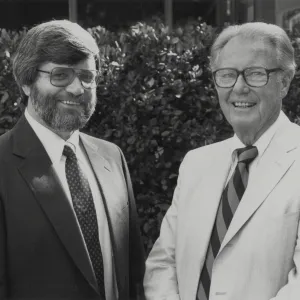 Dr. David Young, Director with Forrest Wallace, Chairman of Operating Committee, Winter 1987