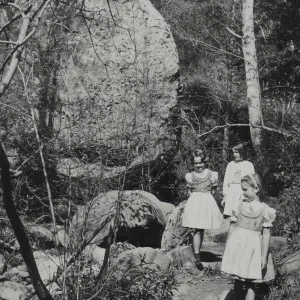 Girls in dresses walking in the Garden