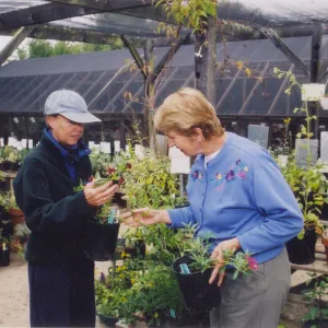 Mary Shehan with visitor in nursery
