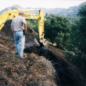 Removal of Mulch pile on ridge above Hort Unit that caught on fire