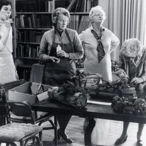 Garden Guild preparing Library for annual Holiday Sale, Jackie Broughton on left