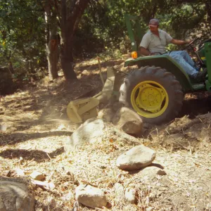 tractor, working on the old Mission Aqueduct