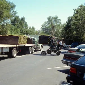 tractor unloading sod for the new Meadow lawn
