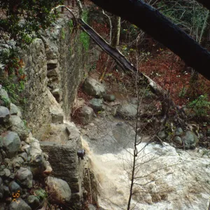 Mission Creek flooding through the Mission Dam